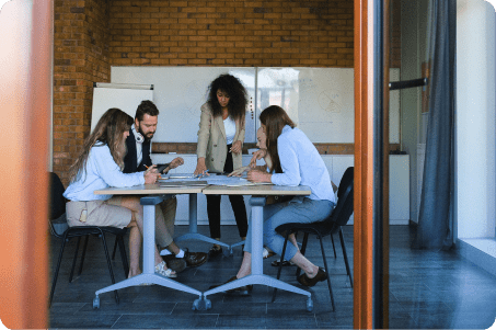 picture of women at the table in the office